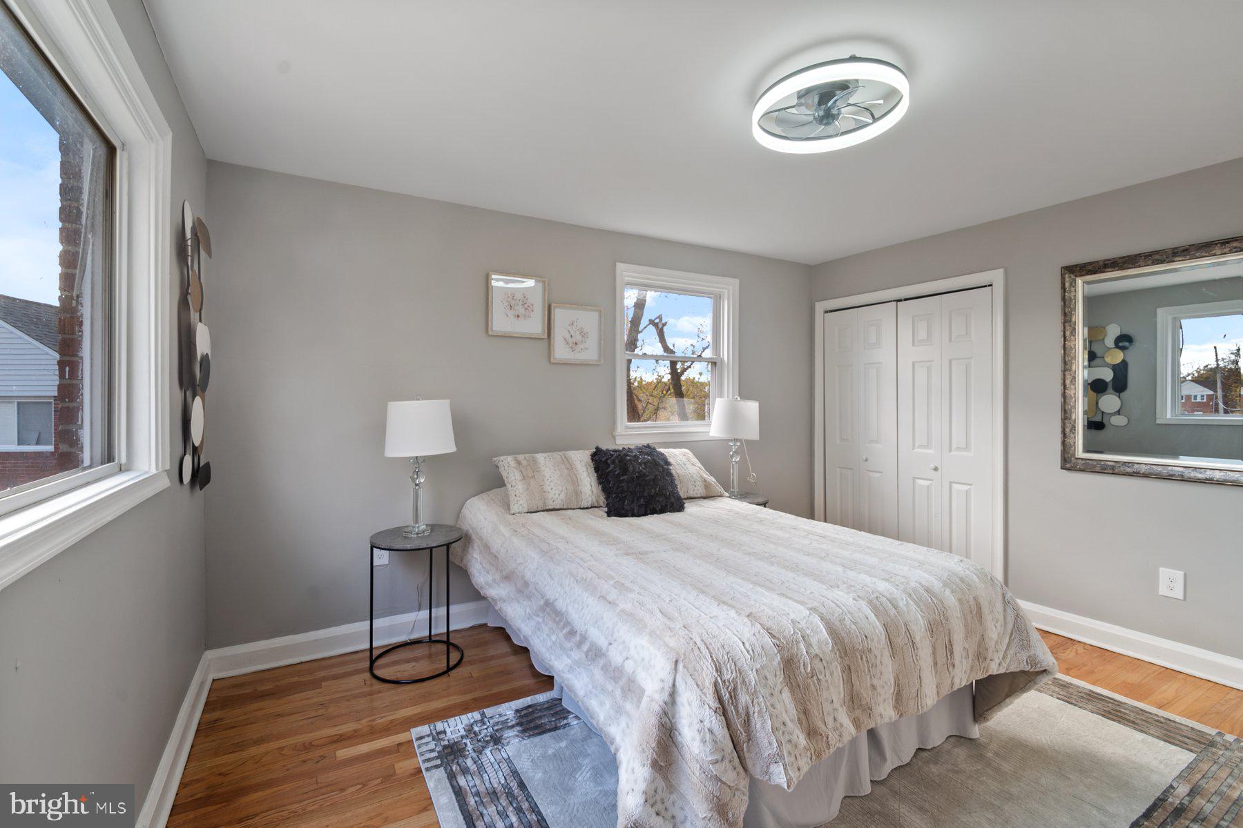 4801 Sinclair Lane Baltimore, MD 21206 - Photo 16 of 28 a bedroom with a bed and a window