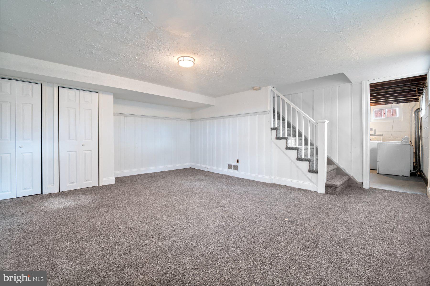 4801 Sinclair Lane Baltimore, MD 21206 - Photo 23 of 28 a view of an empty room with closet and windows