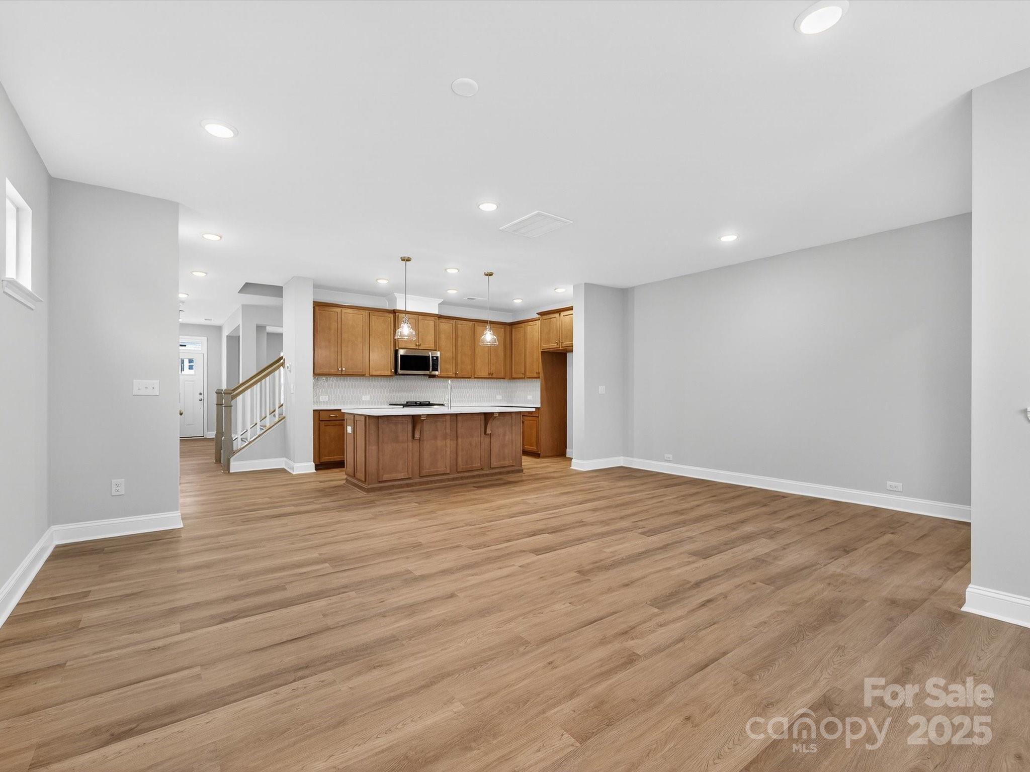 11445 Prosperity Church Road Huntersville, NC 28078 - Photo 14 of 35 a view of kitchen with wooden floor