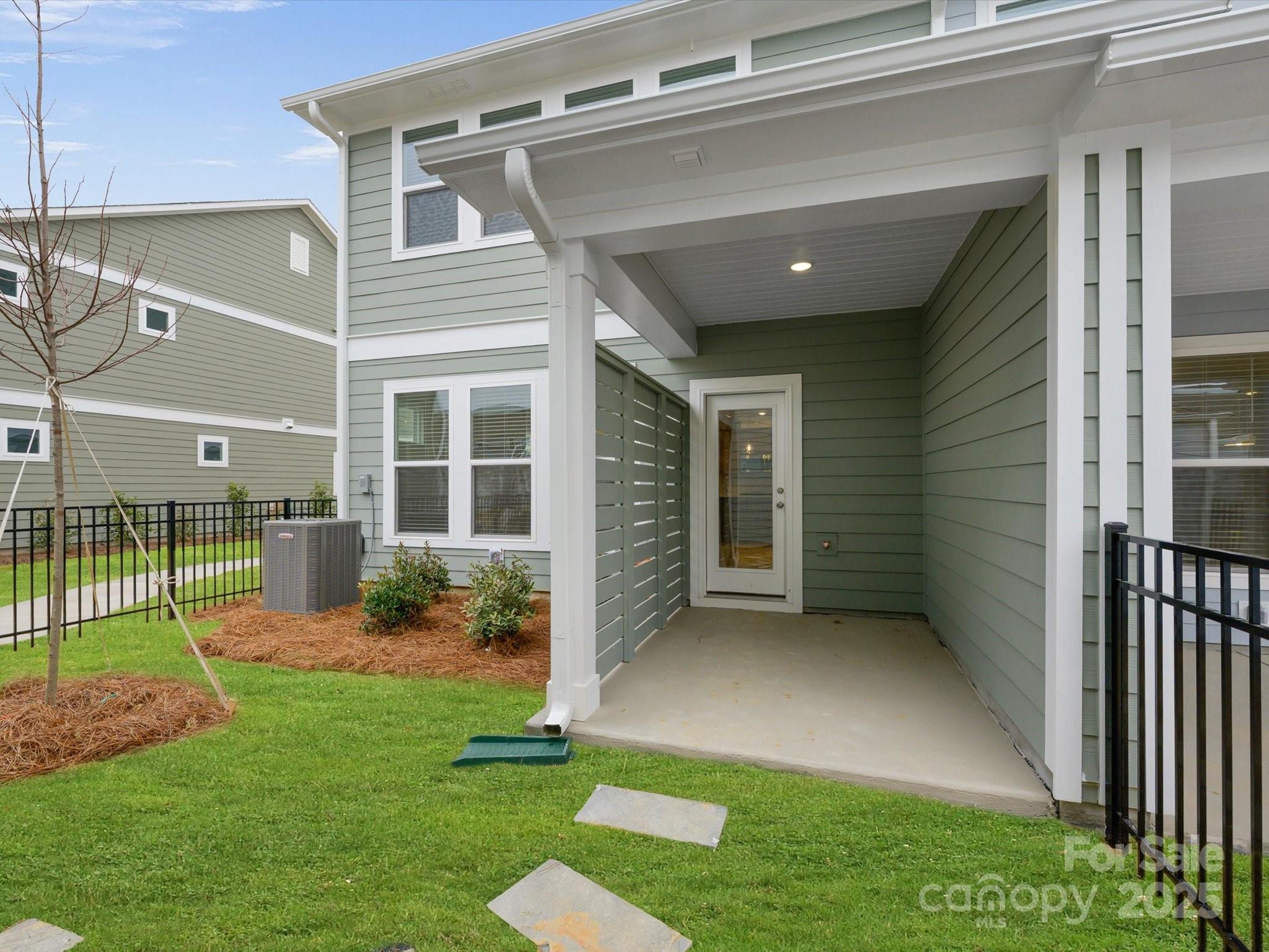 11445 Prosperity Church Road Huntersville, NC 28078 - Photo 26 of 35 a view of a porch with a yard