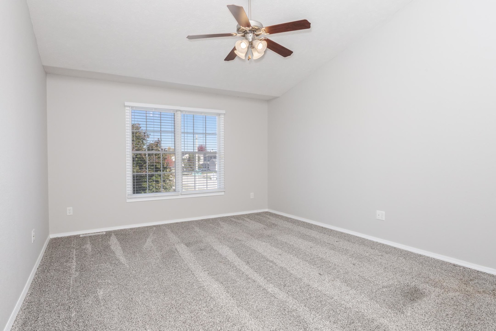 3291 Marimarsh Lane Normal, IL 61761 - Photo 30 of 55 a view of an empty room with a window