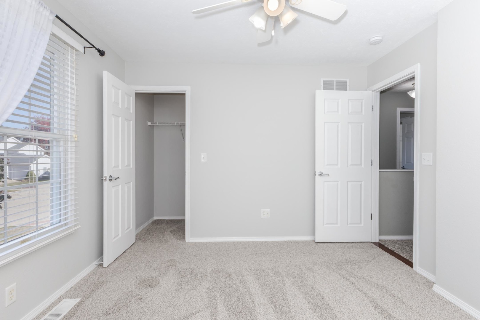 3291 Marimarsh Lane Normal, IL 61761 - Photo 35 of 55 a view of an empty room with a window