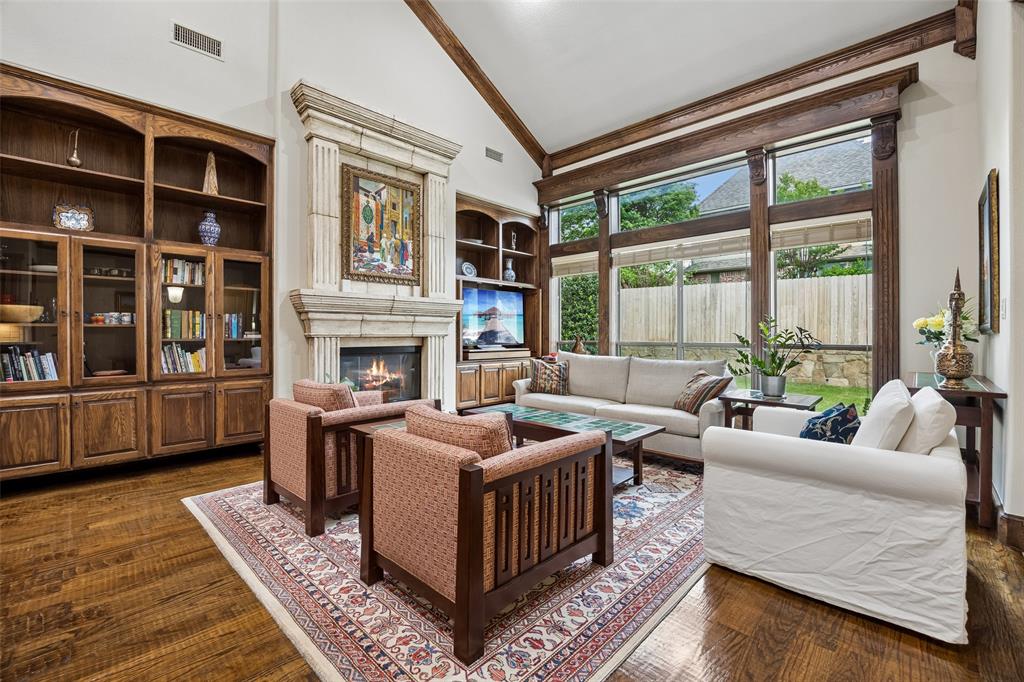 1608 Tuscan Ridge Circle Southlake, TX 76092 - Photo 8 of 36 a living room with furniture fireplace and wooden floor