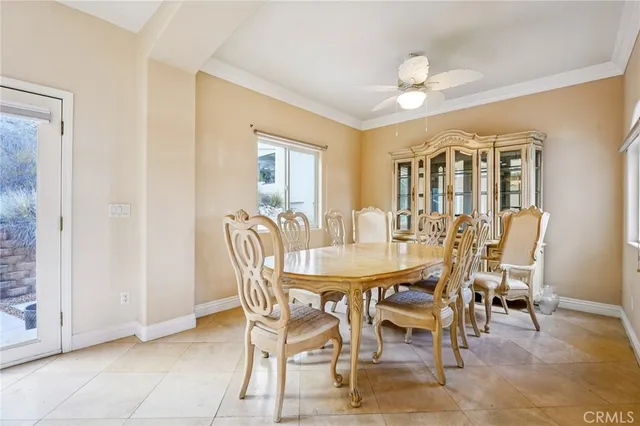a kitchen with stainless steel appliances granite countertop a refrigerator and a stove