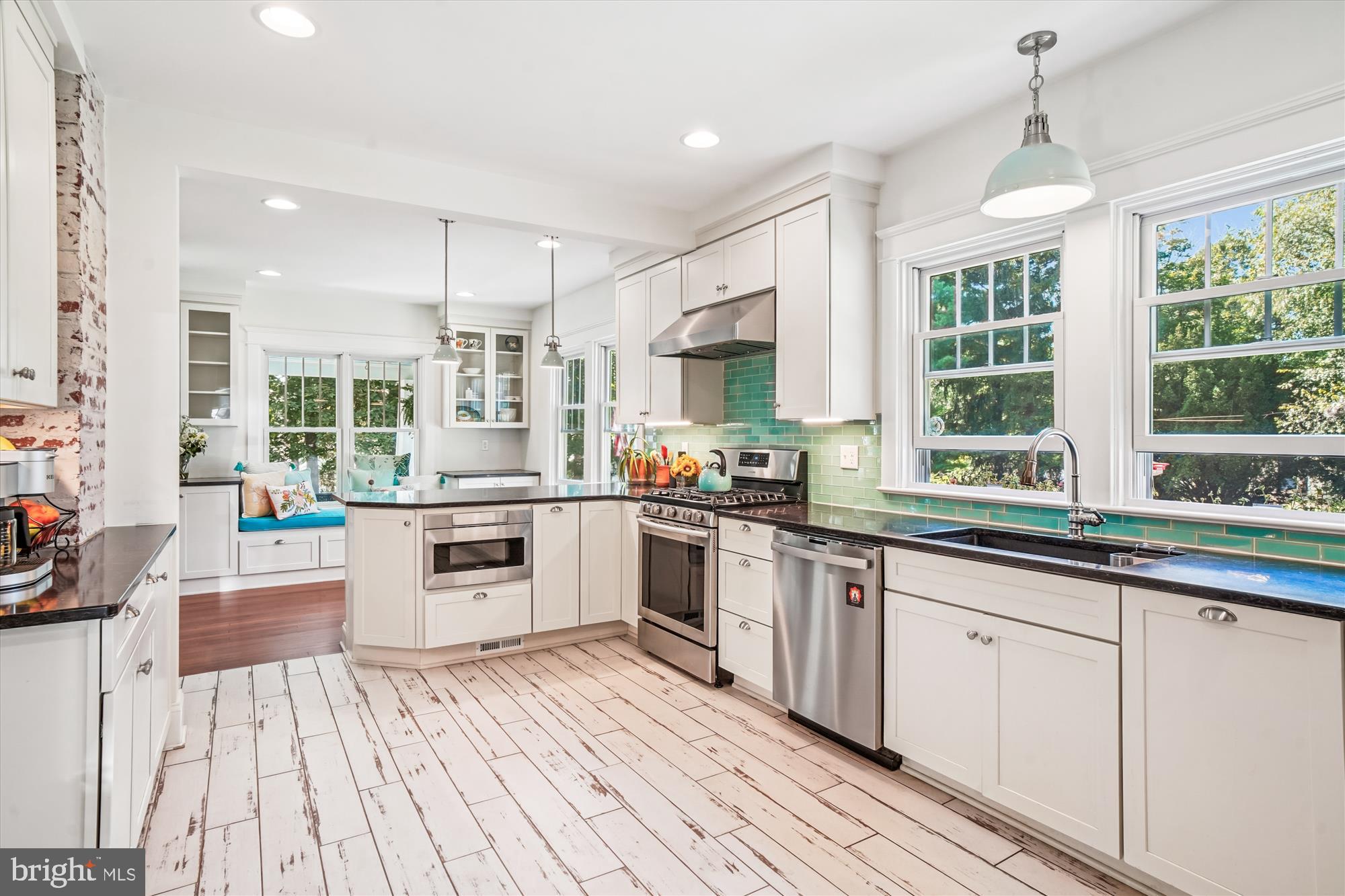 28411 Kemptown Road Damascus, MD 20872 - Photo 23 of 86 a large kitchen with stainless steel appliances granite countertop a stove and a sink