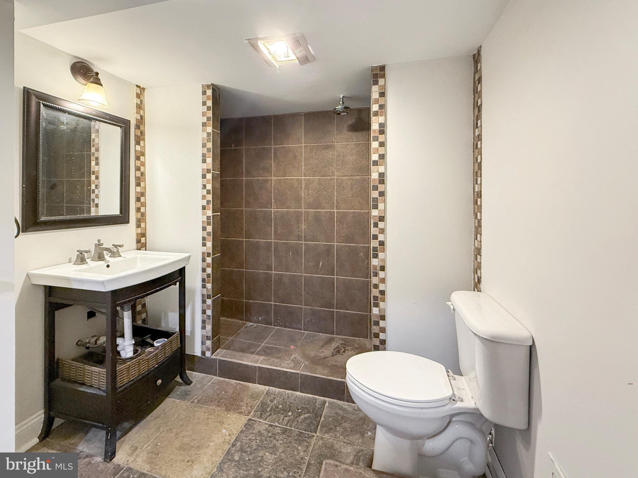 3216 18th Street Northeast Washington, DC 20018 - Photo 44 of 47 Modern bathroom with stylish tiles.
