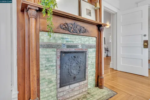 a living room with furniture and a mirror