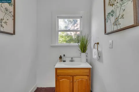 a view of hallway with wooden floor