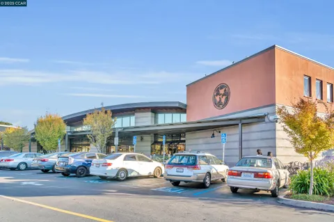 a utility room with lot of cars and windows