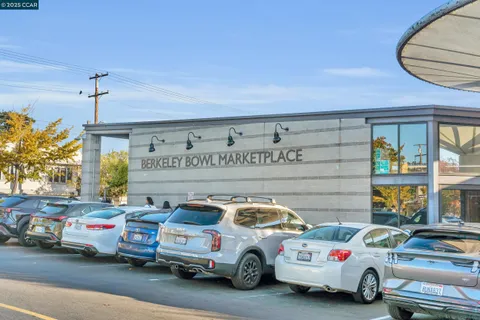 a picture of a bench in front of a wall