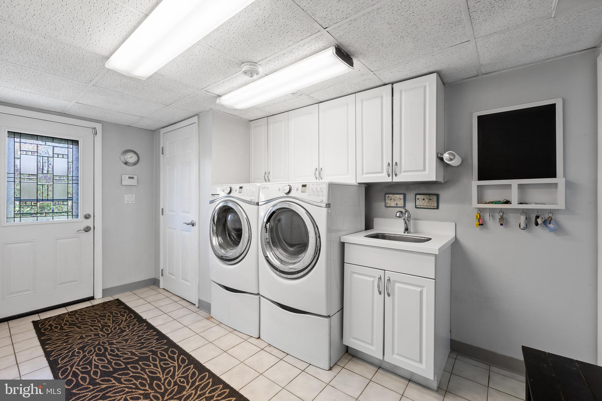 1411 Sandwood Road Conshohocken, PA 19428 - Photo 22 of 33 Lower level laundry with tons of storage