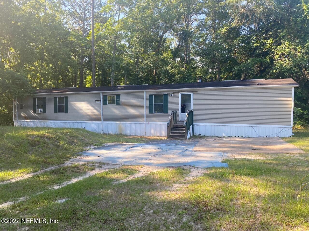 112 Pridgeon Street Interlachen, FL 32148 - Photo 2 of 21 a view front of house with entertaining space