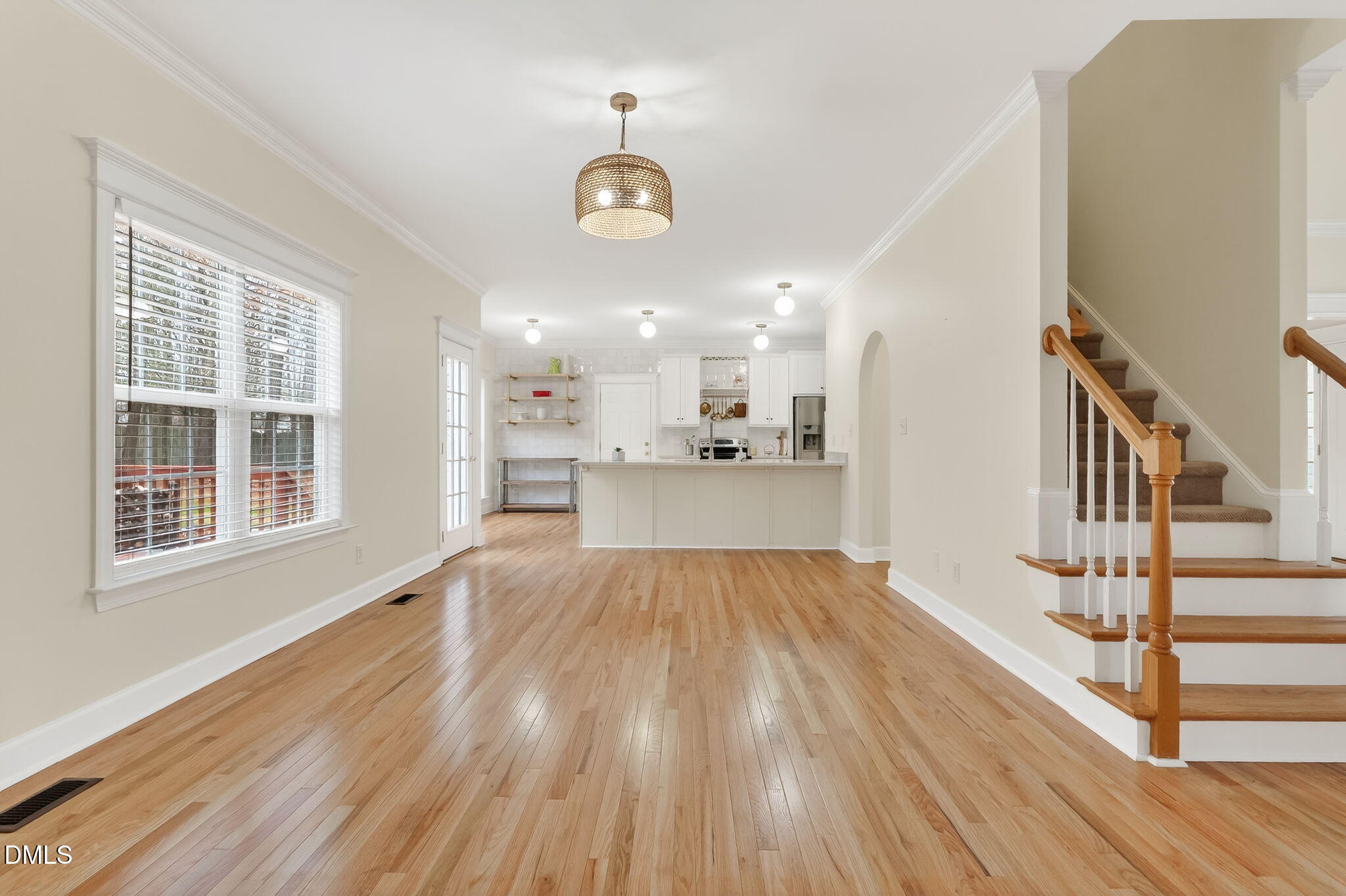 1328 Red Brick Road Garner, NC 27529 - Photo 12 of 64 a view of wooden floor and windows in an empty room