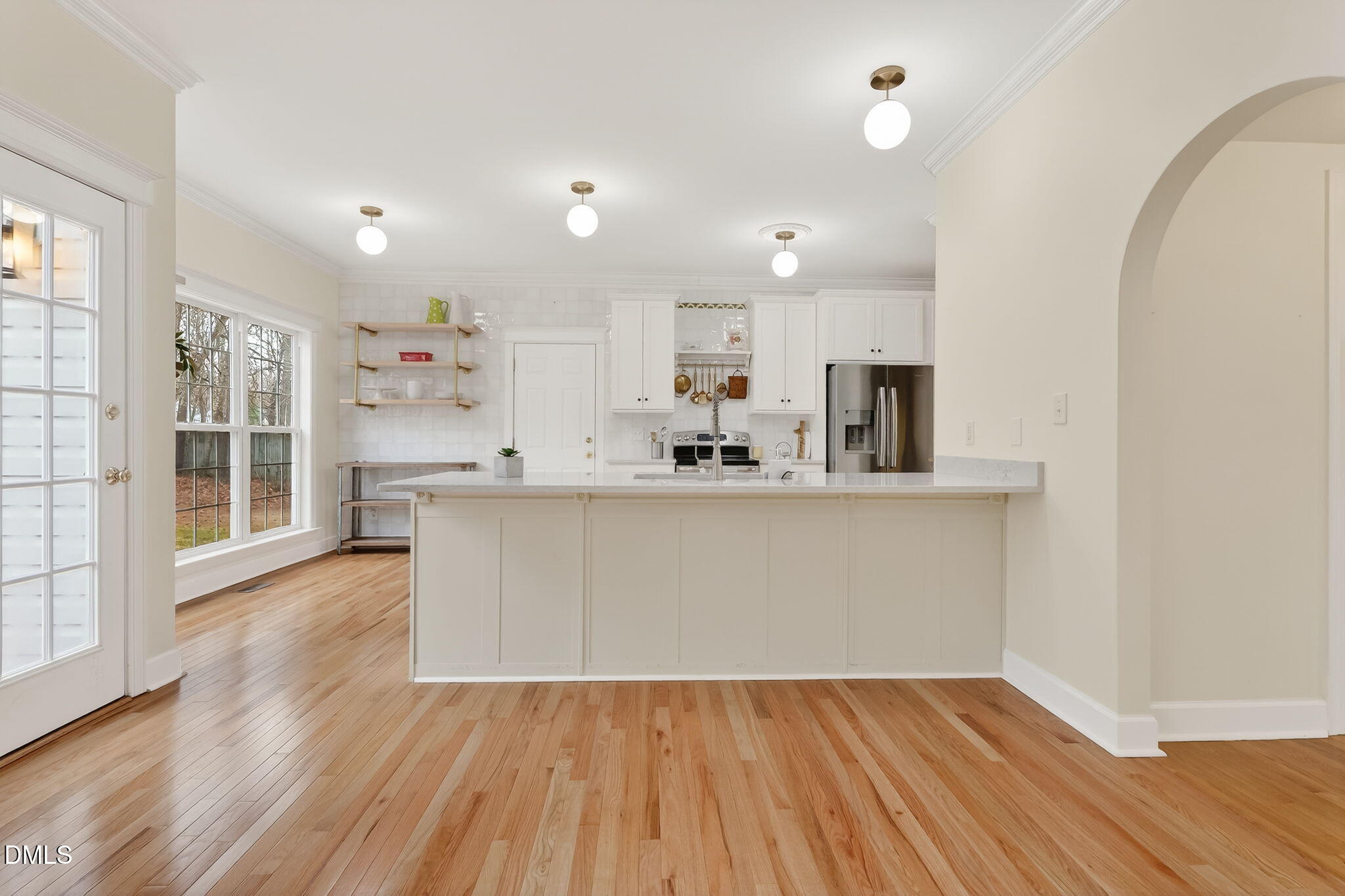1328 Red Brick Road Garner, NC 27529 - Photo 13 of 64 a view of kitchen with wooden floor and electronic appliances