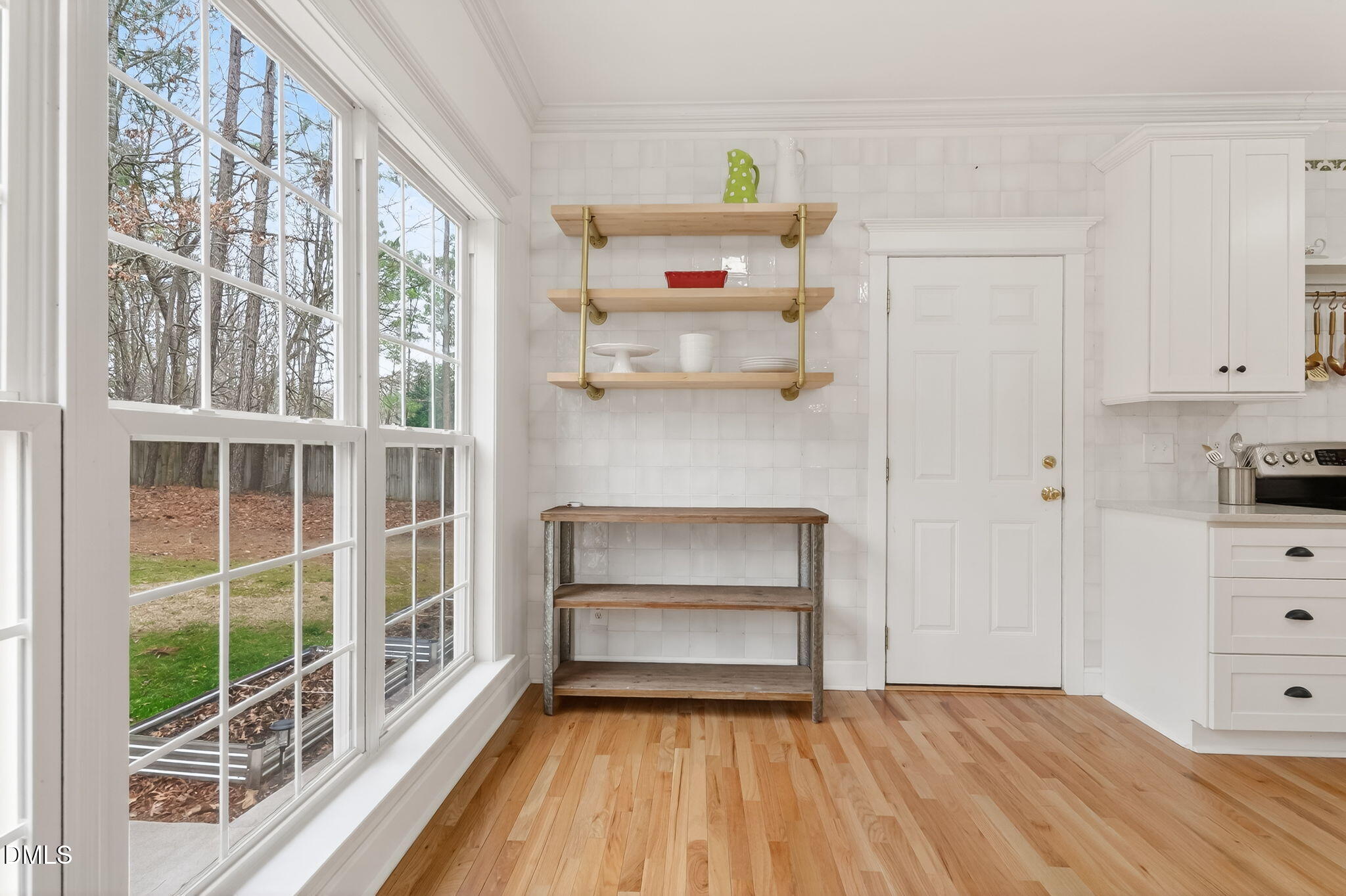 1328 Red Brick Road Garner, NC 27529 - Photo 15 of 64 a bedroom with a bed and a window