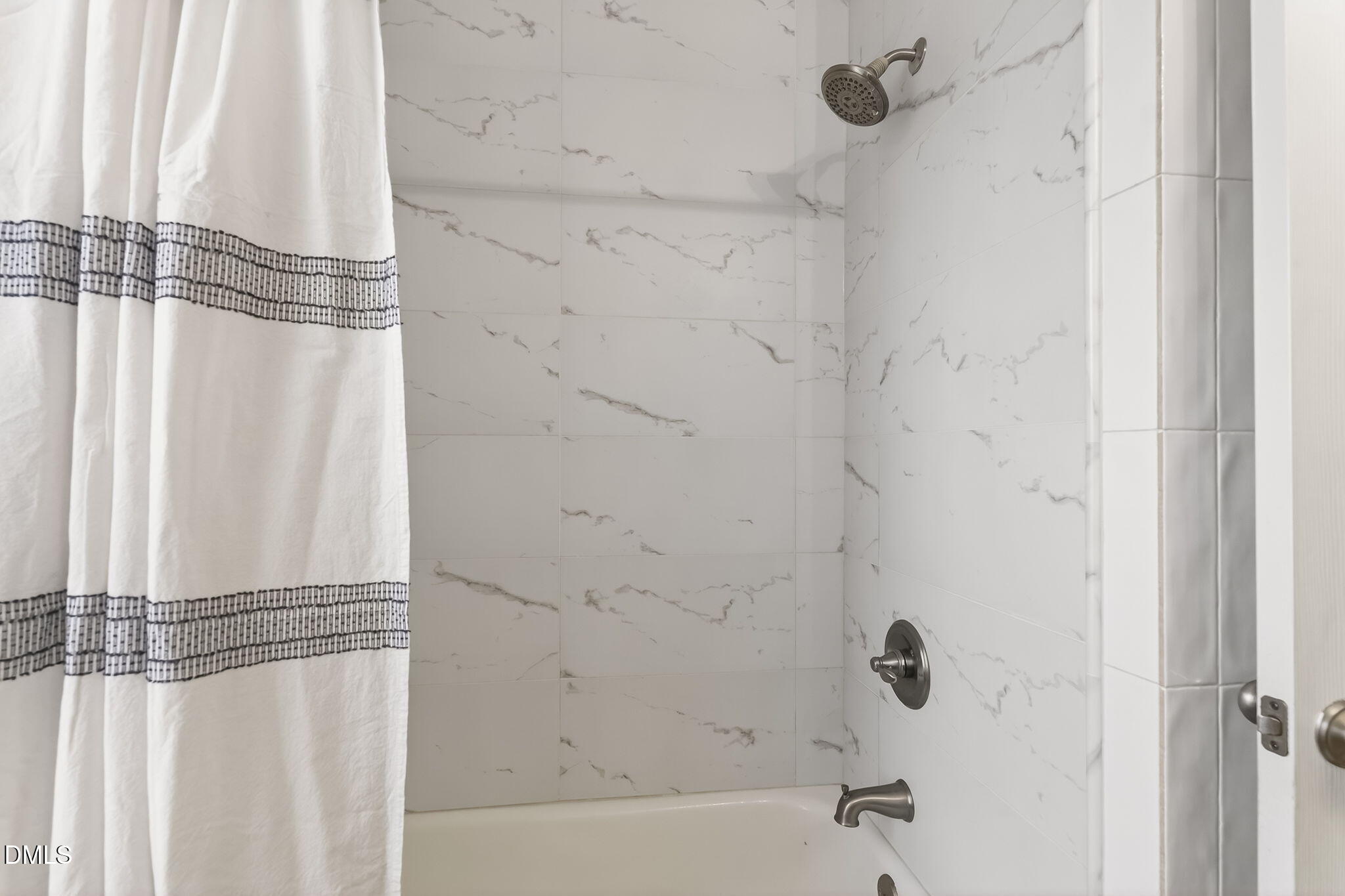 1328 Red Brick Road Garner, NC 27529 - Photo 33 of 64 a bathroom with a bathtub