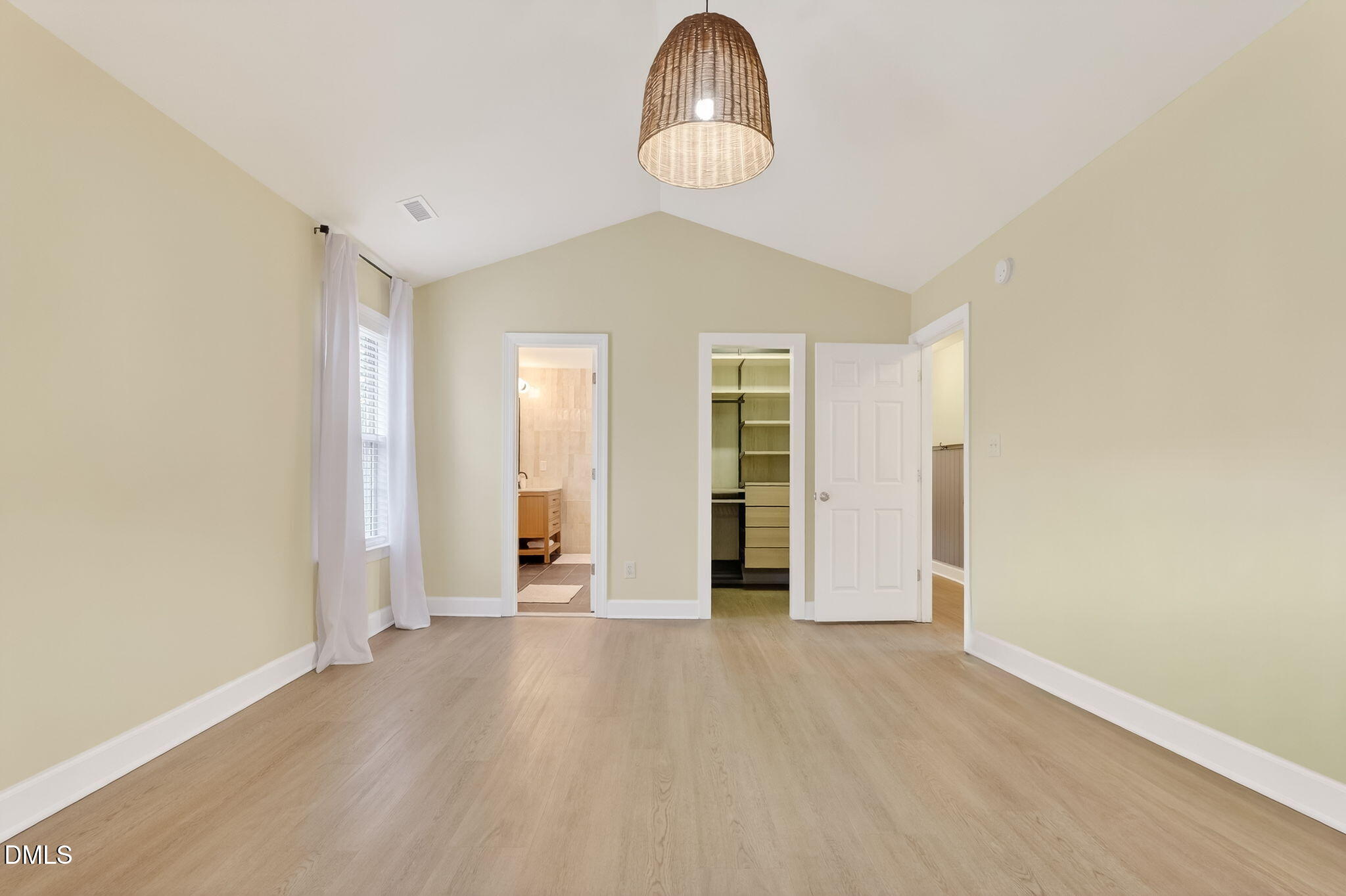 1328 Red Brick Road Garner, NC 27529 - Photo 38 of 64 an empty room with wooden floor and windows