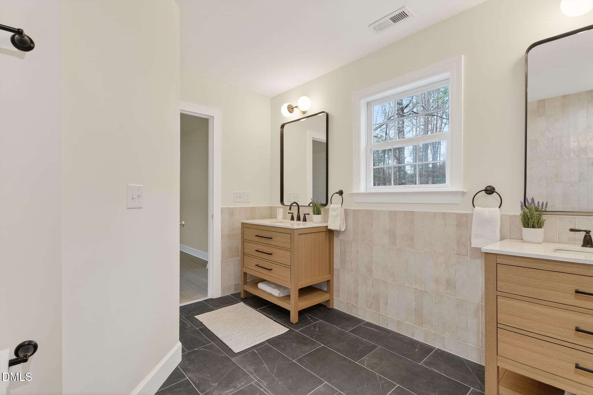 1328 Red Brick Road Garner, NC 27529 - Photo 43 of 64 a room with a sink and a mirror