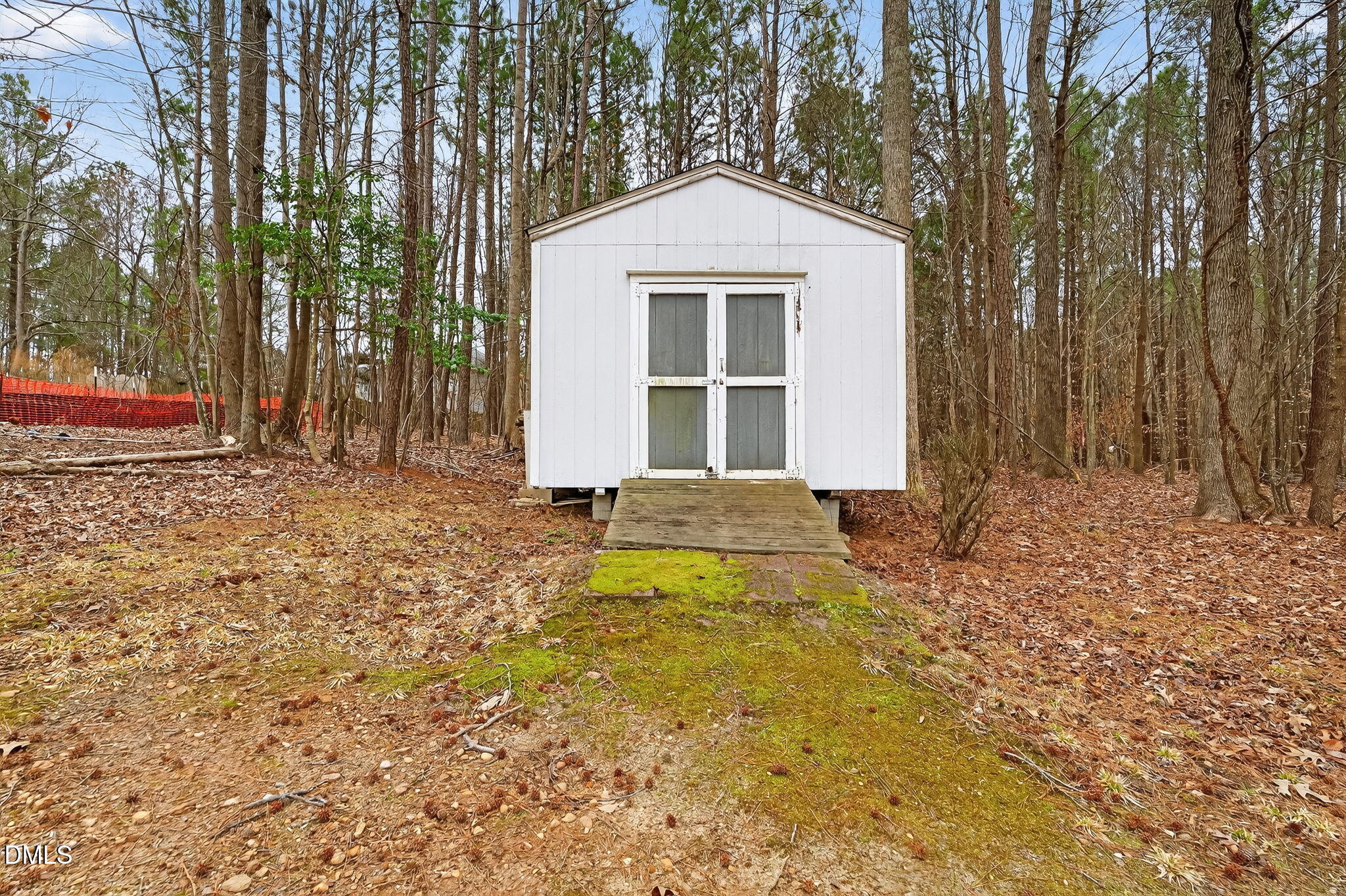 1328 Red Brick Road Garner, NC 27529 - Photo 56 of 64 a front view of a house with a yard