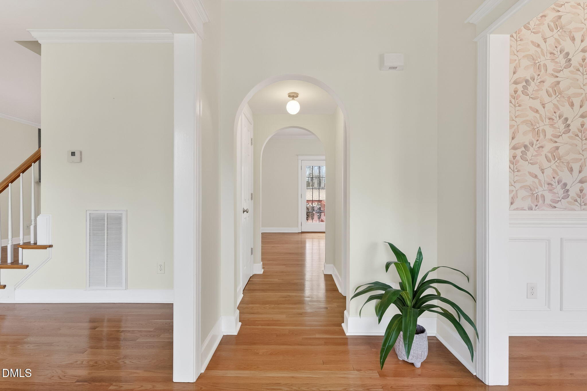 1328 Red Brick Road Garner, NC 27529 - Photo 6 of 64 an entryway with wooden floor and windows