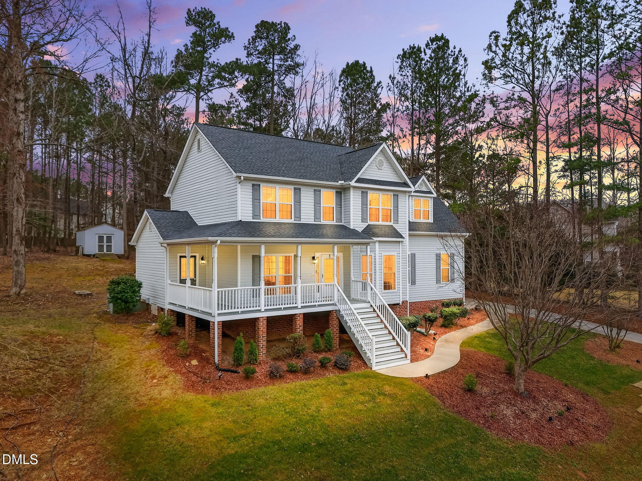 1328 Red Brick Road Garner, NC 27529 - Photo 64 of 64 a view of a house with a yard and deck