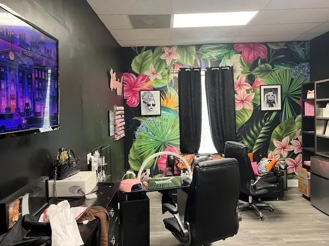 a room with furniture and a flat screen tv