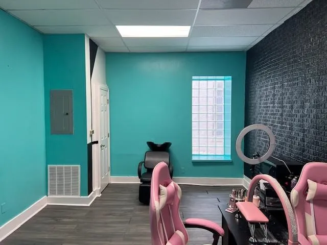 a living room with furniture rug and window
