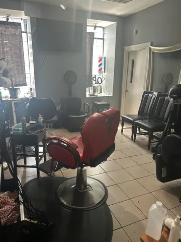 a kitchen with a sink appliances and cabinets