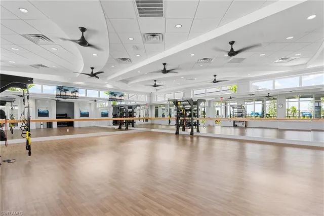 a bedroom with two beds and a table