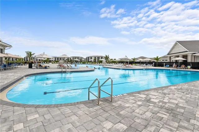 a front view of a building with sitting area