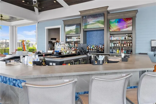 a view of a lake with houses in the back