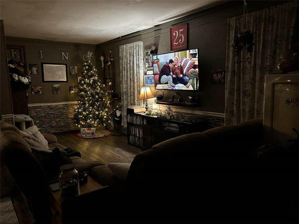 845 Mottern Road Punxsutawney, PA 15767 - Photo 12 of 37 a room with lots of different colored cloths and wooden floor