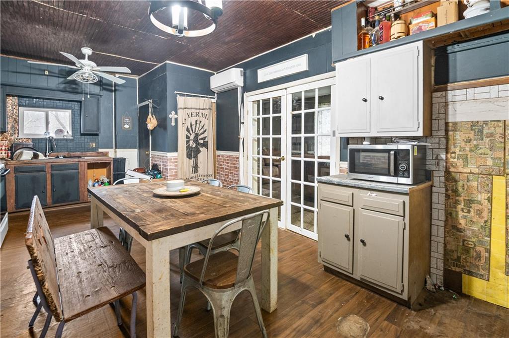 845 Mottern Road Punxsutawney, PA 15767 - Photo 16 of 40 a kitchen with a table chairs and microwave