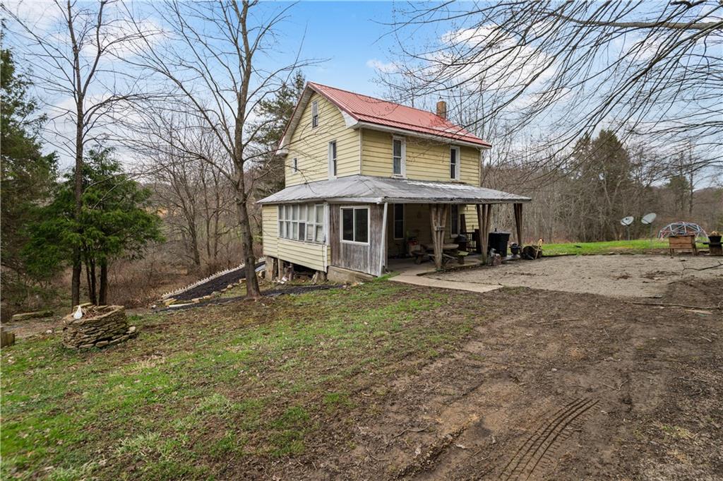845 Mottern Road Punxsutawney, PA 15767 - Photo 2 of 40 a view of a house with a yard and large tree