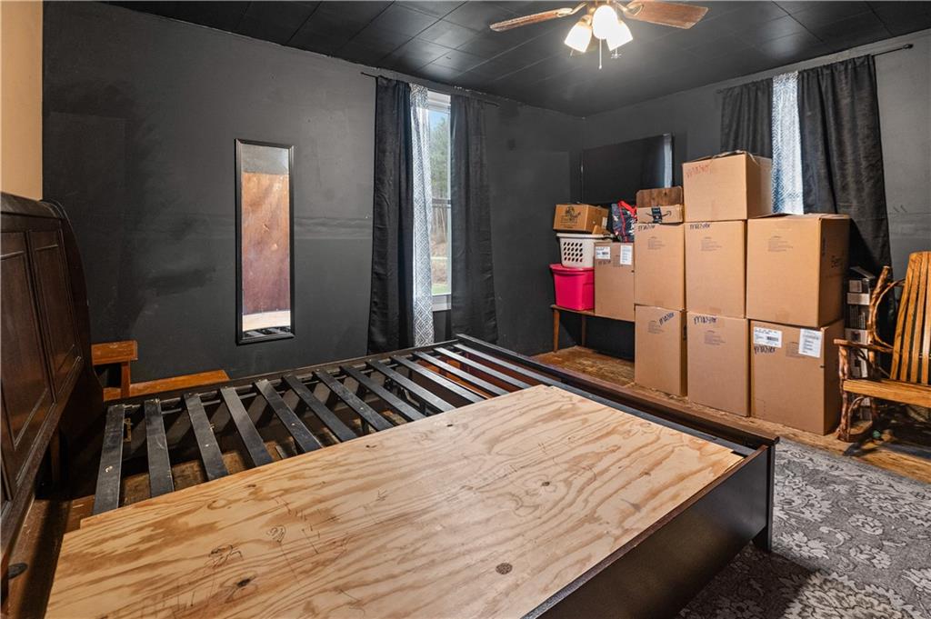 845 Mottern Road Punxsutawney, PA 15767 - Photo 26 of 40 a bedroom with a bed and a flat tv screen on dresser