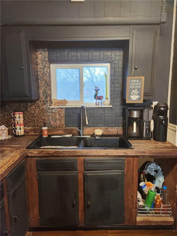 845 Mottern Road Punxsutawney, PA 15767 - Photo 7 of 37 a kitchen with stainless steel appliances a stove a sink and a microwave