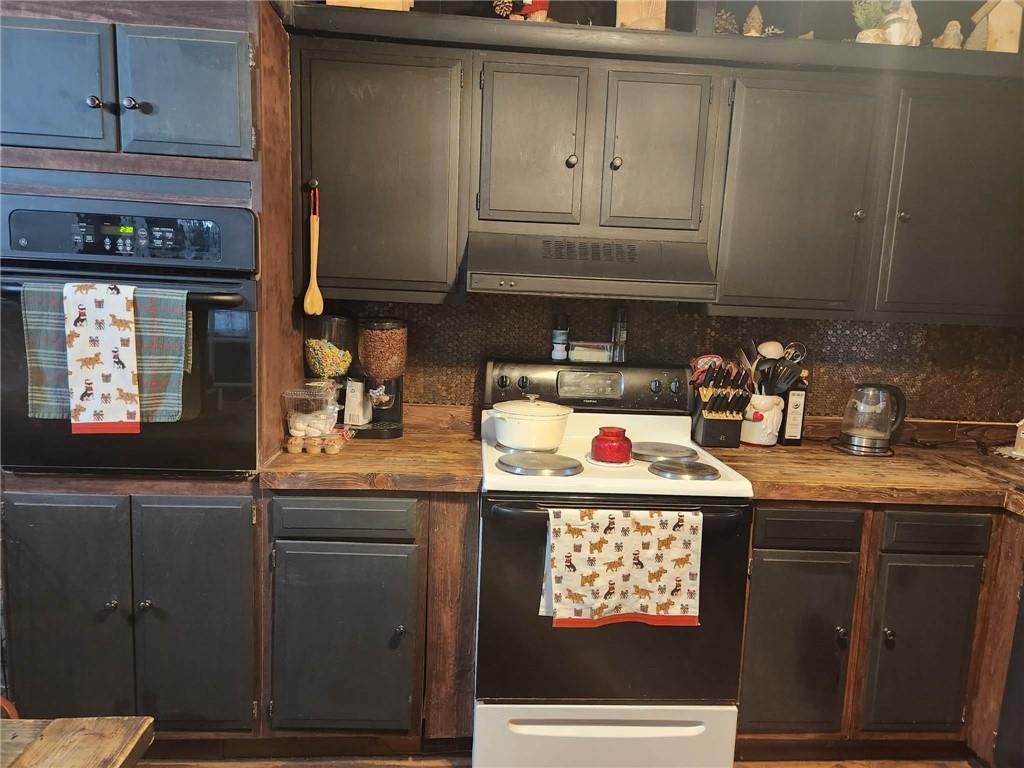 845 Mottern Road Punxsutawney, PA 15767 - Photo 9 of 37 a kitchen with a sink a stove and cabinets