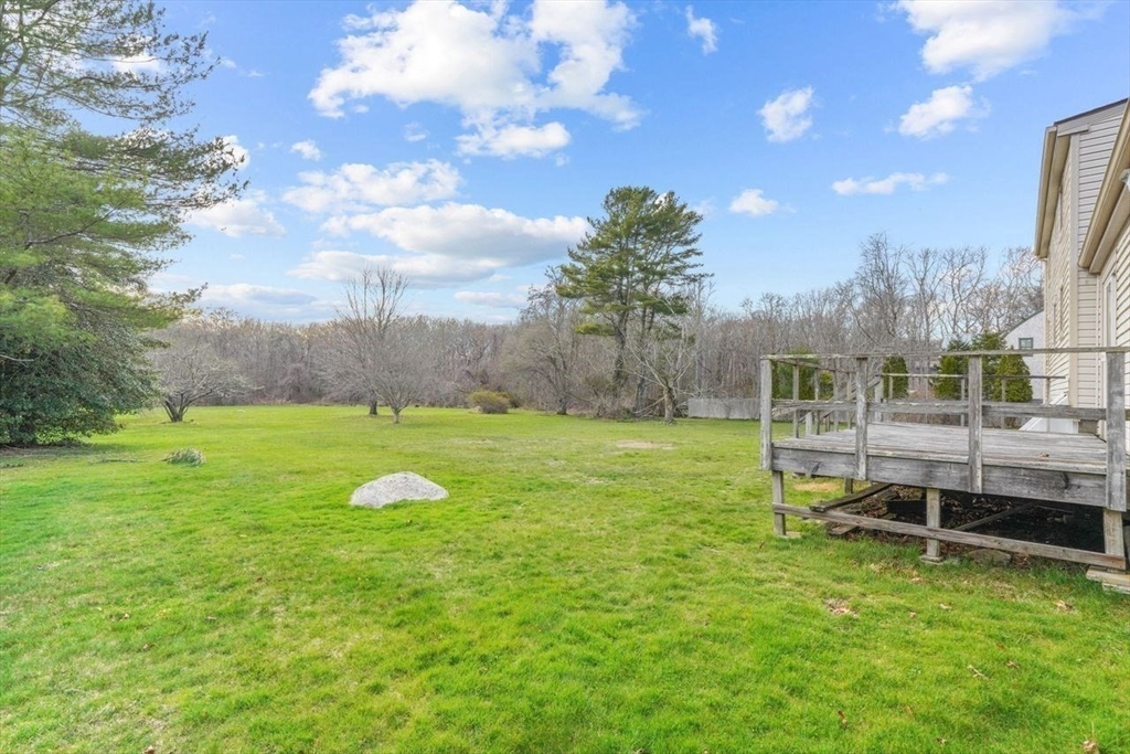 49 Old Stone Church Road Little Compton, RI 02837 - Photo 4 of 27 a view of yard with swimming pool and trees