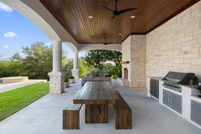 a dining room with furniture and a garden