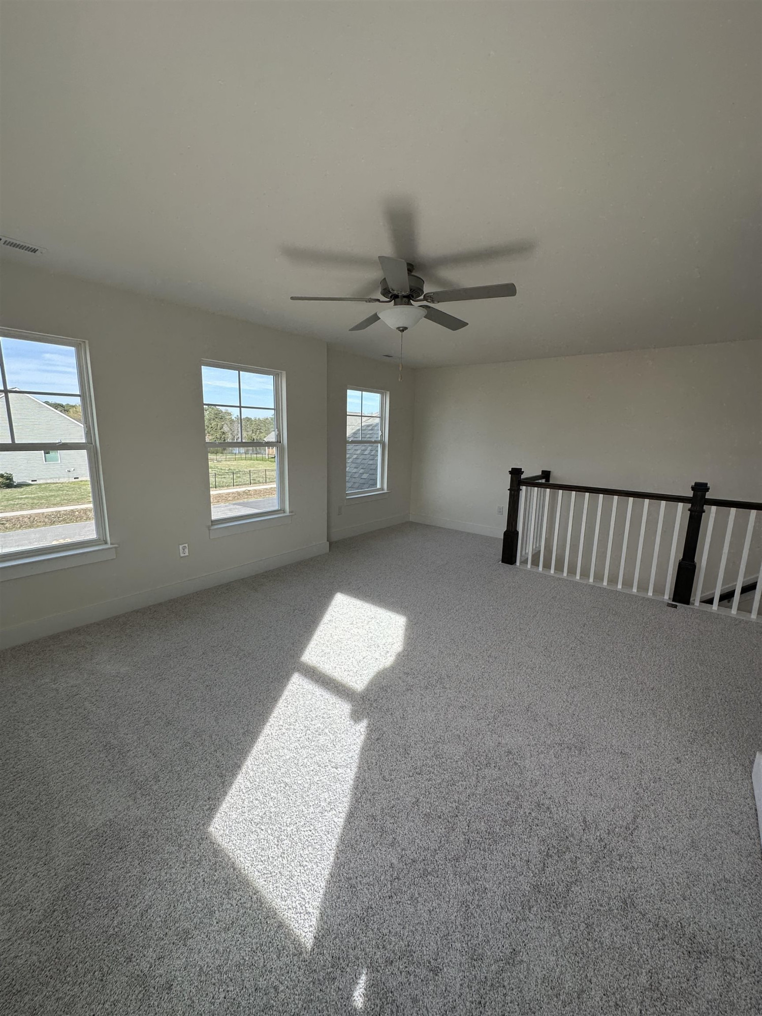 4500 Beckel Road Willow Spring, NC 27592 - Photo 12 of 27 a view of an empty room with a window