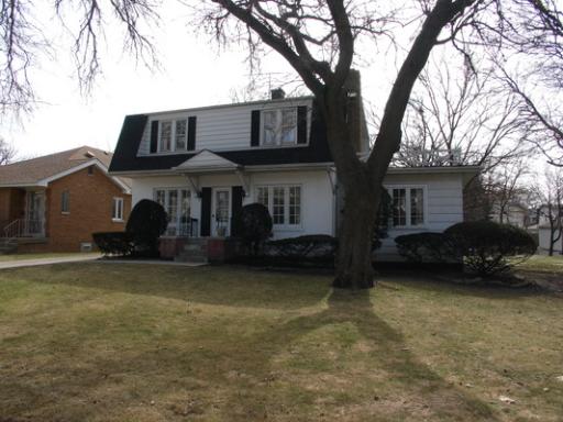 261 Olmsted Road Riverside, IL 60546 - Photo 1 of 1 a view of a house with a garden and trees