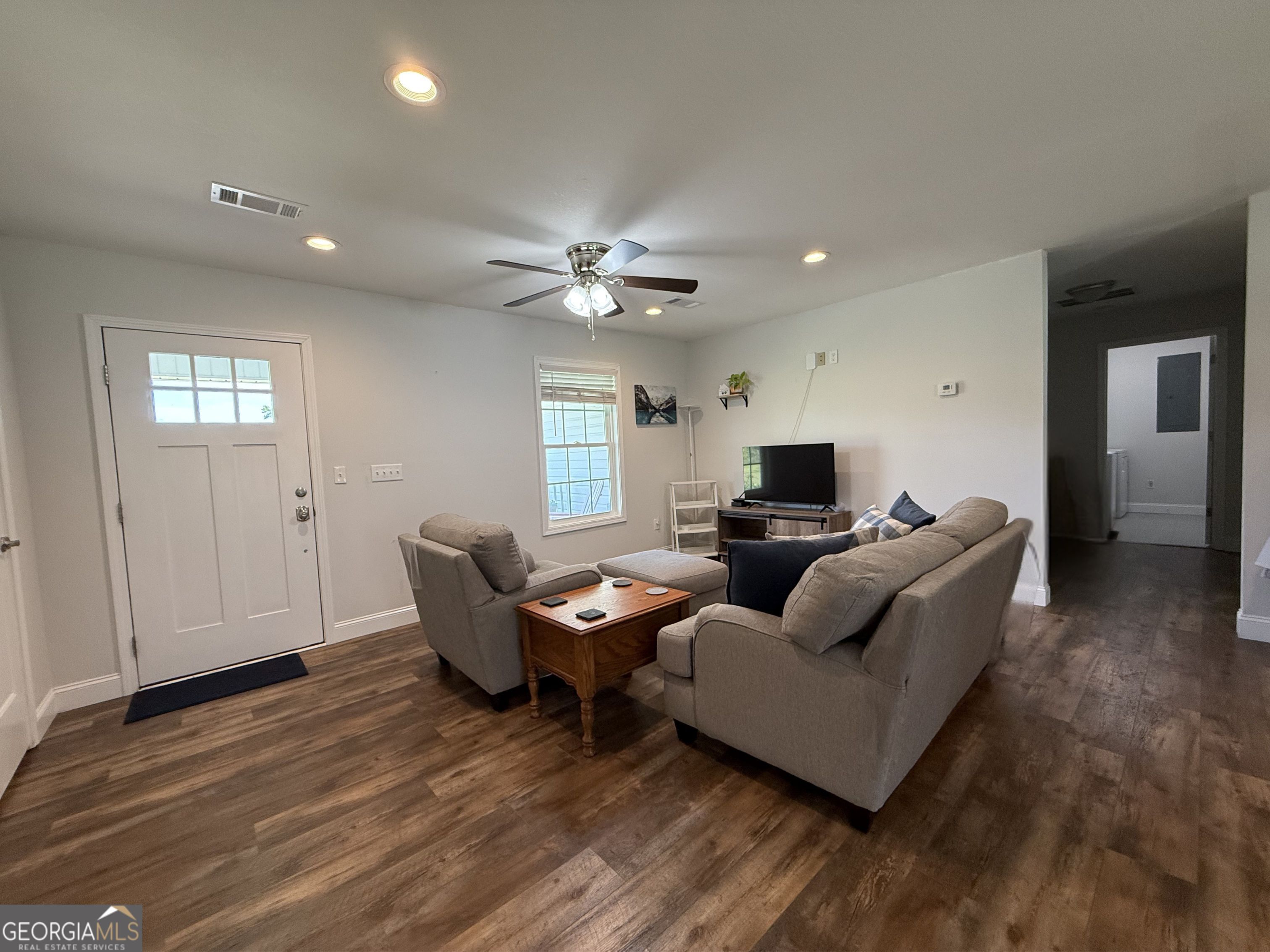 365 Quail Lane Alston, GA 30473 - Photo 3 of 9 a living room with furniture and a wooden floor