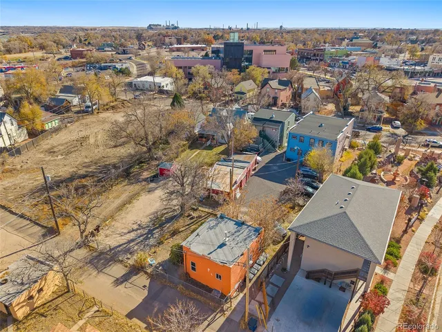 an aerial view of a city with lots of residential buildings