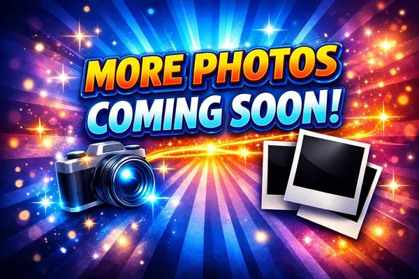 a view of an outdoor space with a sign and a street