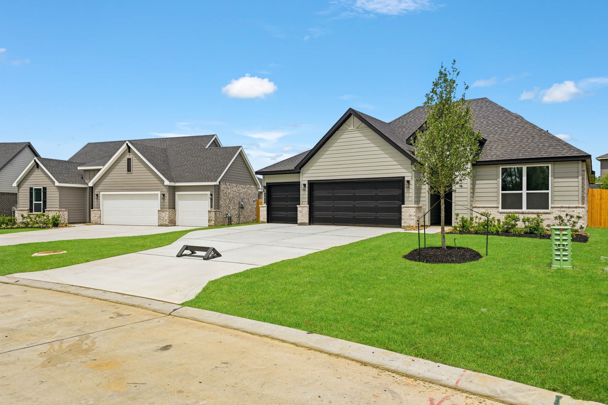 4613 Vernal Loop Conroe, TX 77303 - Photo 2 of 35 a front view of house with yard and green space