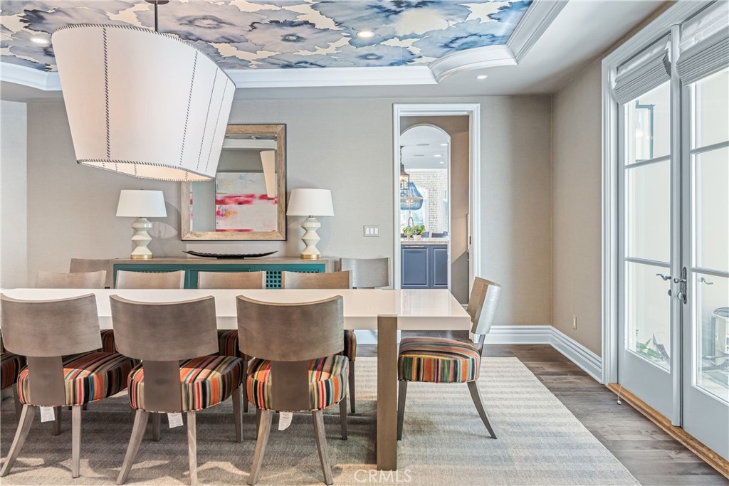 1240 5th Street Manhattan Beach, CA 90266 - Photo 19 of 68 a view of a dining room with furniture and wooden floor