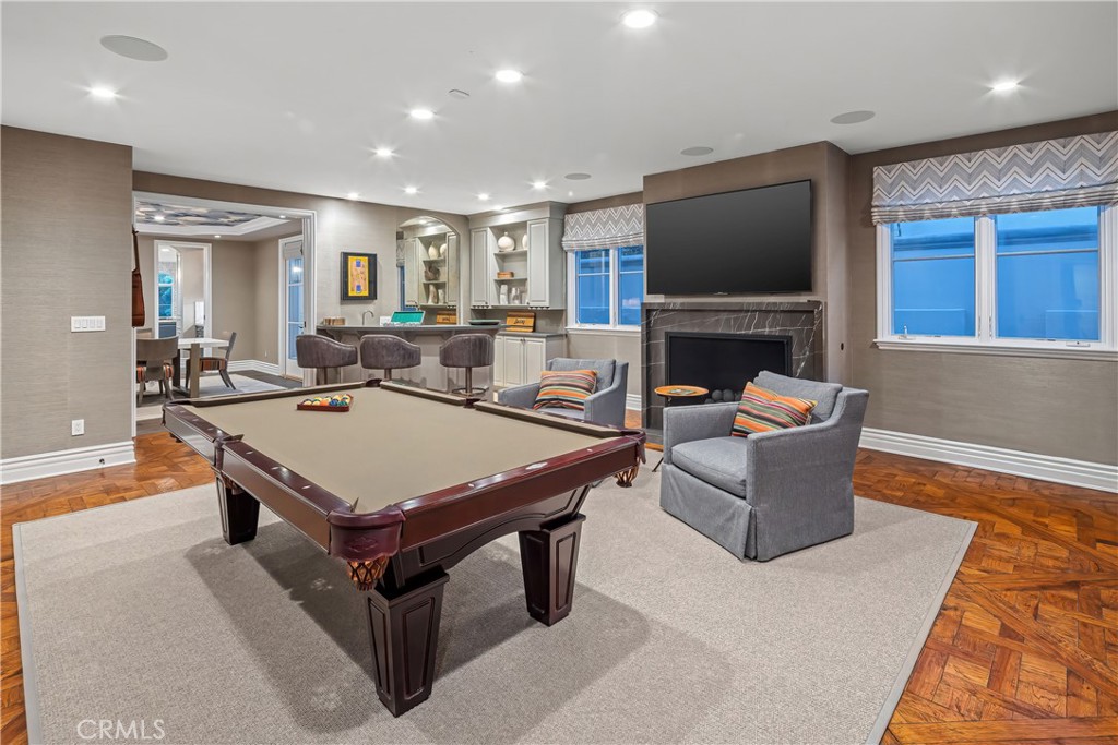 1240 5th Street Manhattan Beach, CA 90266 - Photo 22 of 68 a living room with fireplace furniture and a flat screen tv