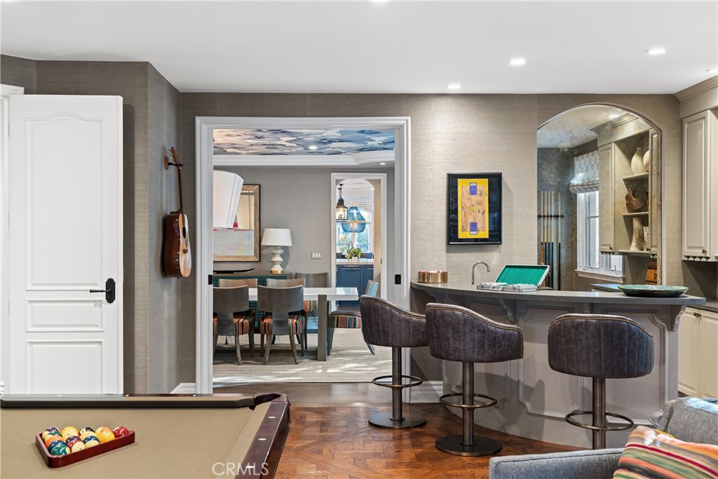1240 5th Street Manhattan Beach, CA 90266 - Photo 23 of 68 a living room with couches chairs and a large mirror with wooden floor