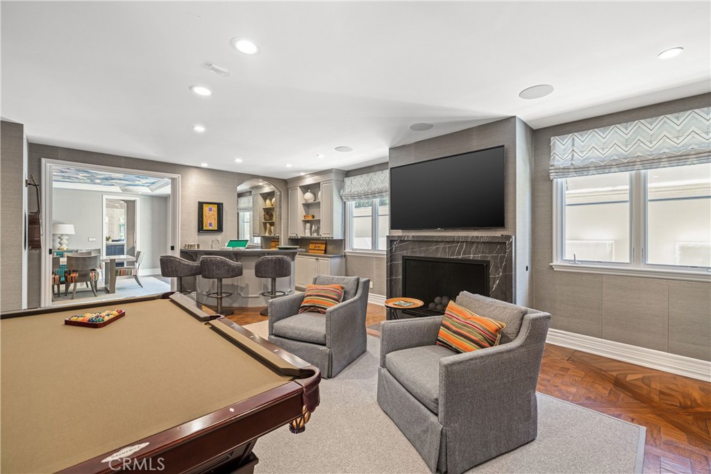 1240 5th Street Manhattan Beach, CA 90266 - Photo 24 of 68 a living room with fireplace furniture and a flat screen tv