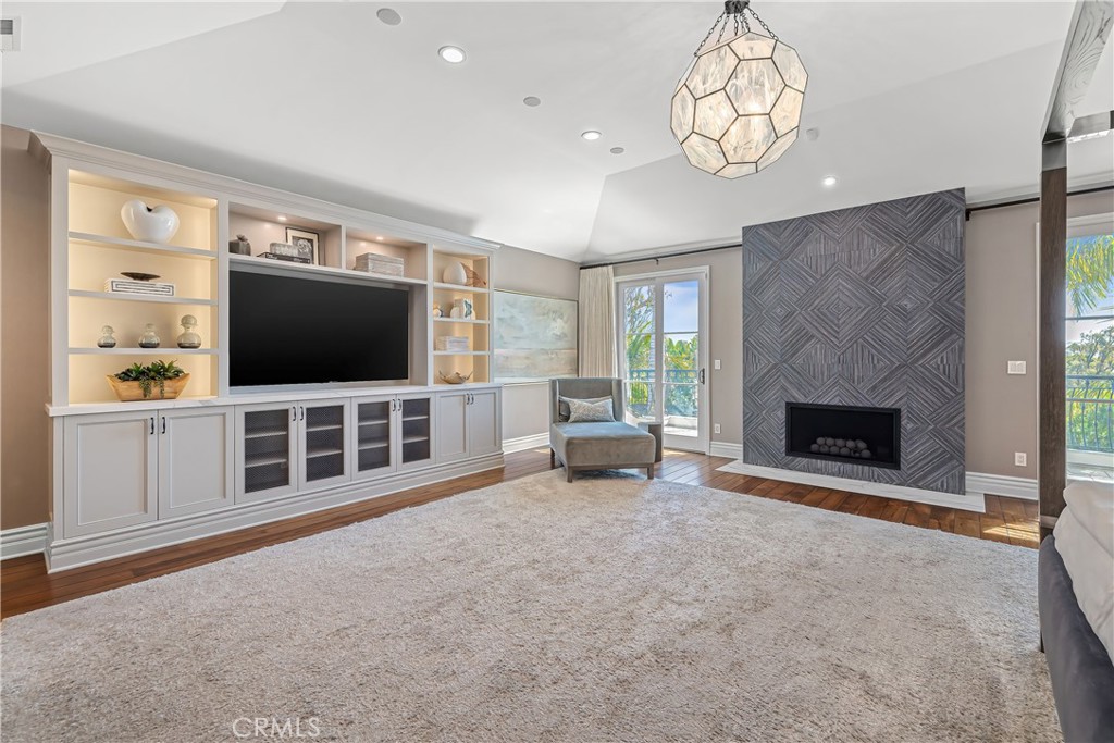 1240 5th Street Manhattan Beach, CA 90266 - Photo 34 of 68 a living room with furniture and a flat screen tv